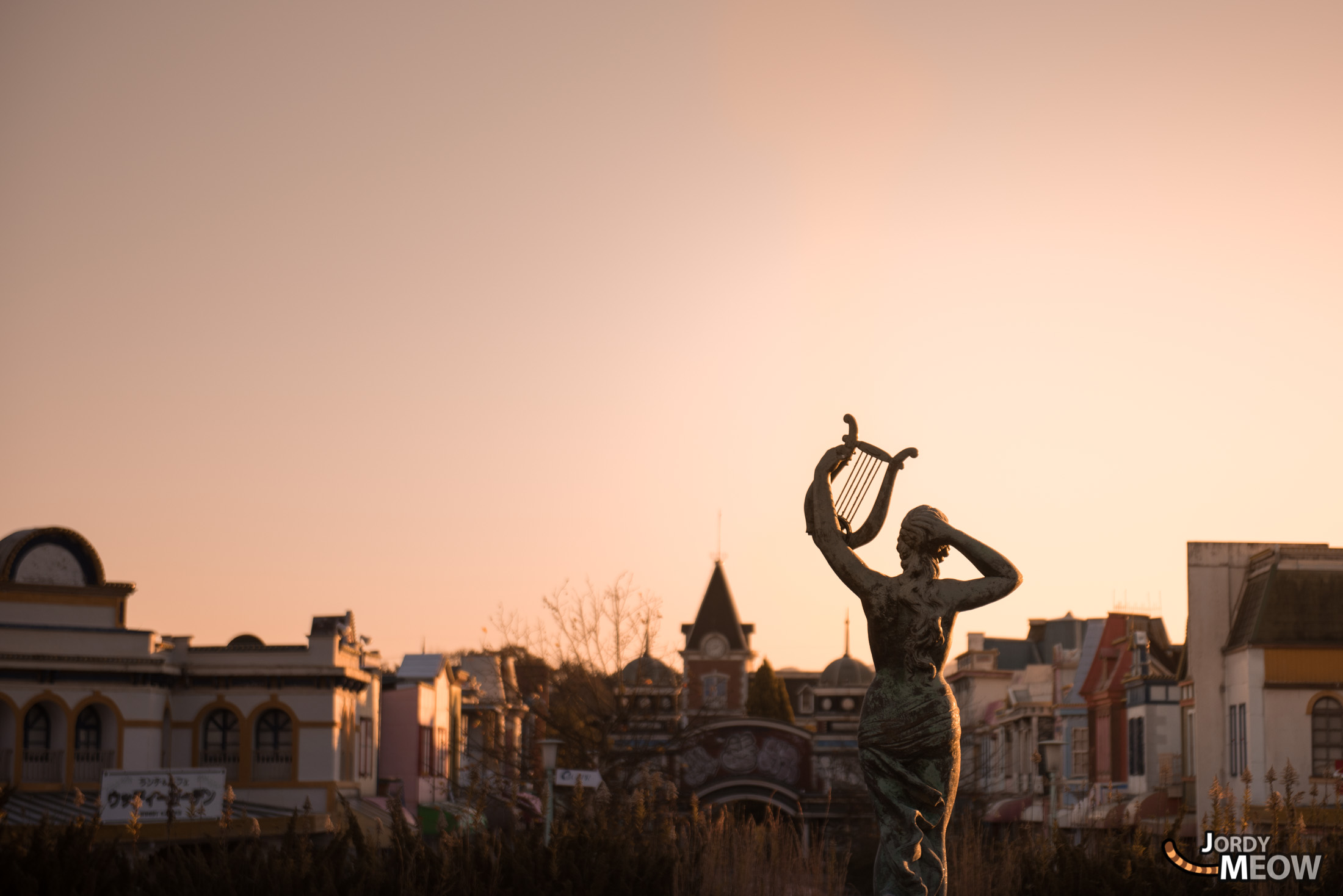 Eerie ruins of Nara Dreamland at sunset, a haunting reminder of impermanence.