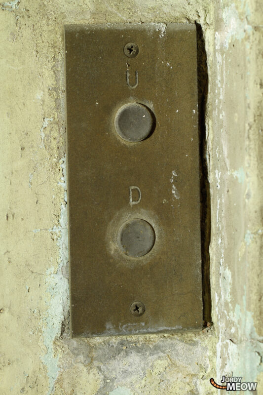 Abandoned Negishi Grandstand control panel in Yokohama, historic horse racing venue turned printing press.