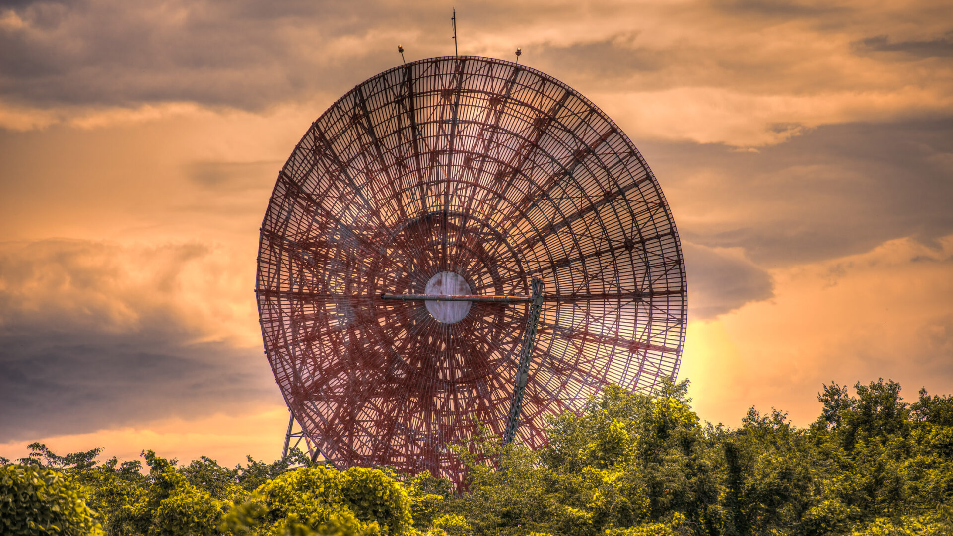 Explore the decaying antenna in Fuchu, a forgotten relic in natures embrace.
