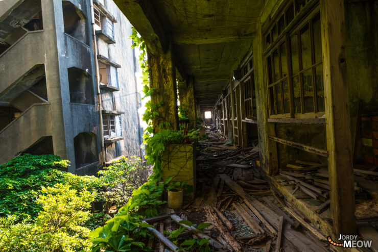 Exploring Gunkanjima: Abandoned City in Nagasaki - urban decay and haunting atmosphere.
