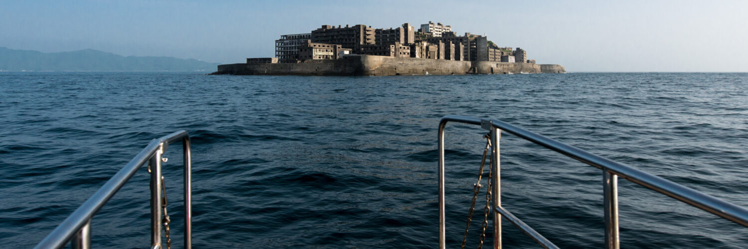 Exploring the abandoned beauty of Gunkanjima, Japans haunted Battleship Island.