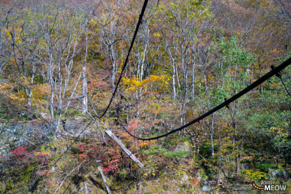 Exploring the Abandoned Wagakawa Hydro Plant amidst Autumn Beauty in Tohoku, Japan.