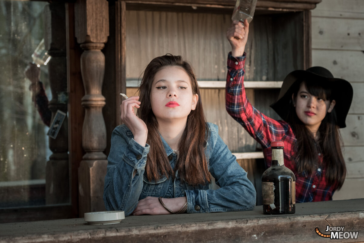 Exploring Urban Decay: Two women in abandoned Western Village theme park.