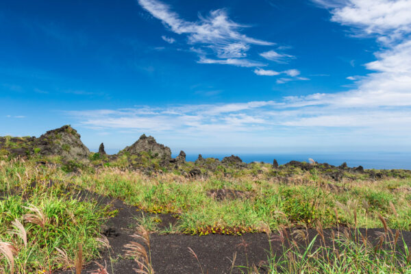 Explore Oshima Islands Majestic Volcanic Landscape.