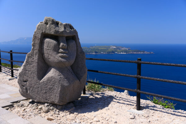 Breathtaking ocean view from Ishiyama Observation Deck with majestic stone sculpture.