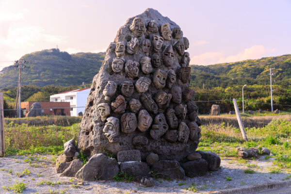 Faces of Nature: Carved Stone Sculptures in Rural Landscape.