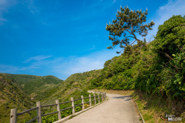 Explore the stunning Kuniga Coast on Nishinoshima Island, Japan - a rugged and dramatic paradise.