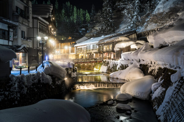 Winter Wonderland: Ginzan Onsen - A Japanese Hot Spring Town in Snow.