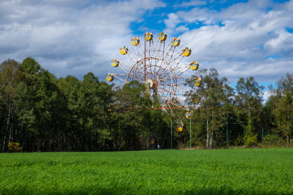 Abandoned ferris wheel at derelict Gluck Kingdom theme park.