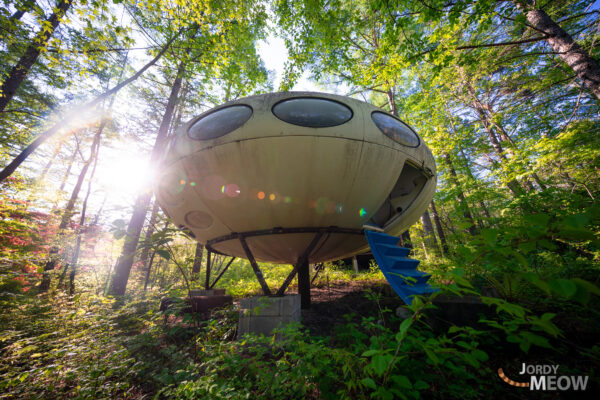 Futuristic Saucer House in Lush Japanese Forest