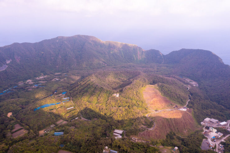Aogashima volcanic island: Pacific crater, lush slopes