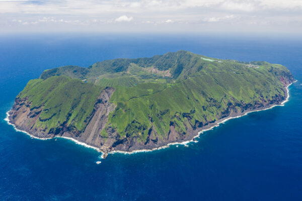 Breathtaking aerial view of Aogashimas volcanic double-caldera.