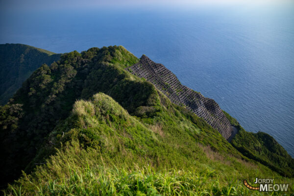 Enigmatic Geometric Structures Atop Lush Coastal Hills