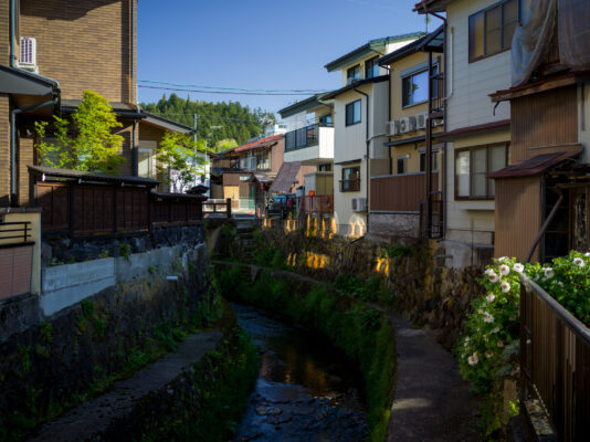 Tranquil Japanese riverside town scenery