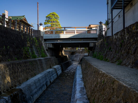 Tranquil Japanese river bridge landscape