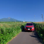 Rishiri Islands scenic mountain road, red car
