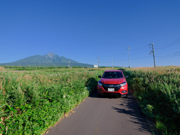 Rishiri Islands scenic mountain road, red car