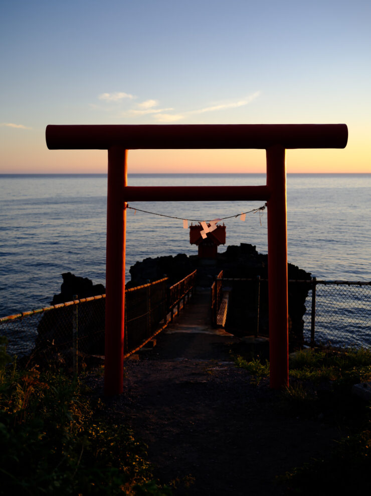 Tranquil Rishiri Torii Gate Sunset Reflection