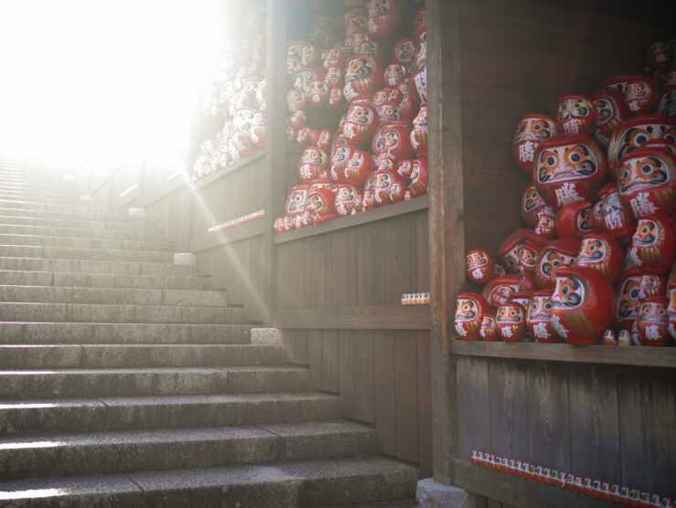 Traditional Japanese Daruma dolls display staircase.