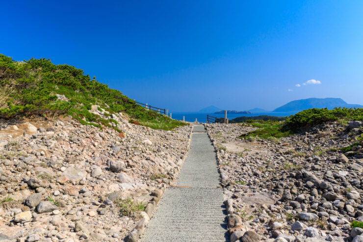Shikinejima Islands scenic coastal wooden trail.
