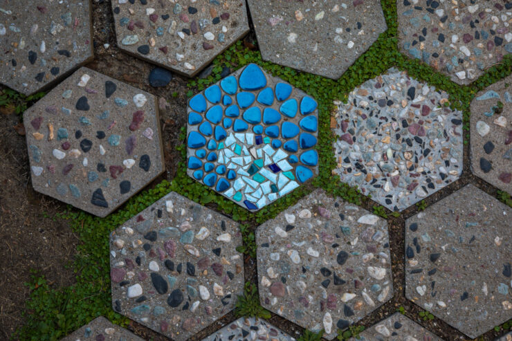 Vibrant hexagonal mosaic pavement in historic Onomichi, Japan.