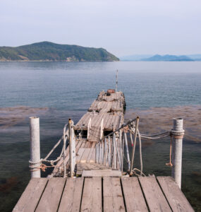 Scenic Wooden Dock on Tranquil Mountain Lake, Japan