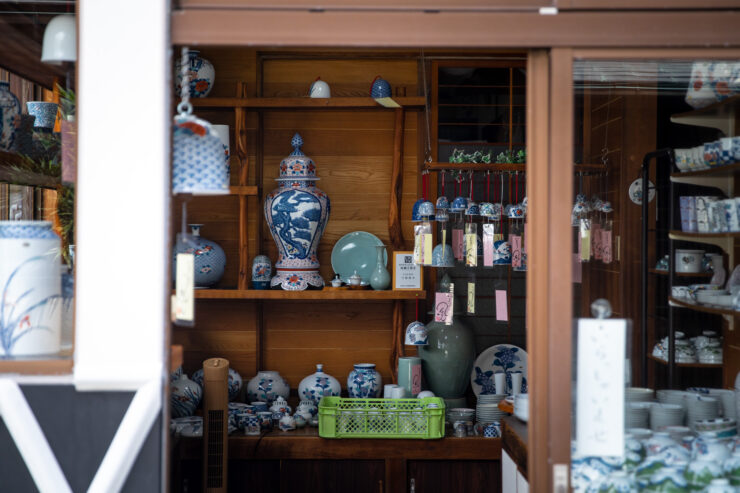 Antique ceramics, glassware display shelves.