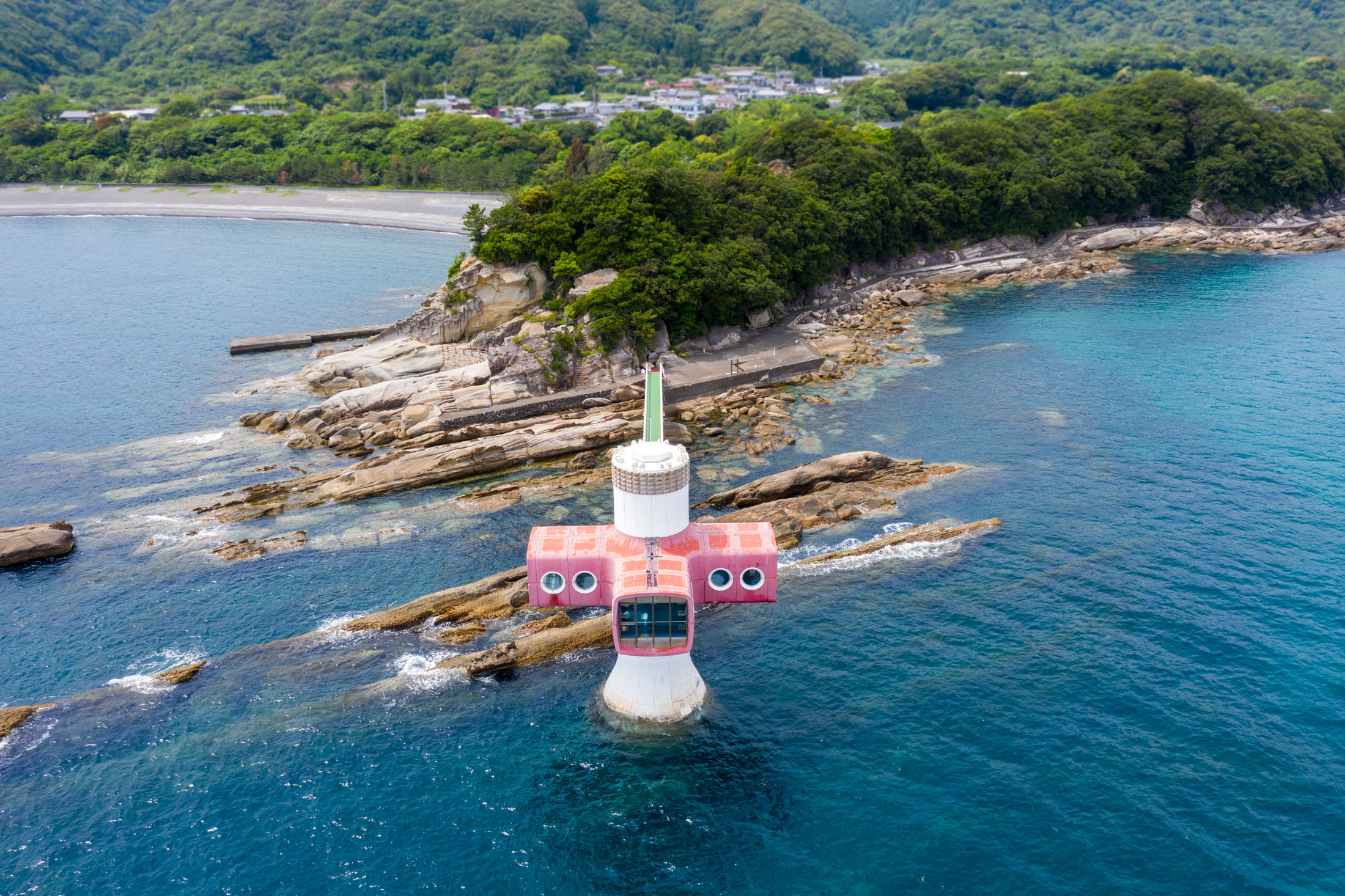 Playful pink lighthouse island paradise
