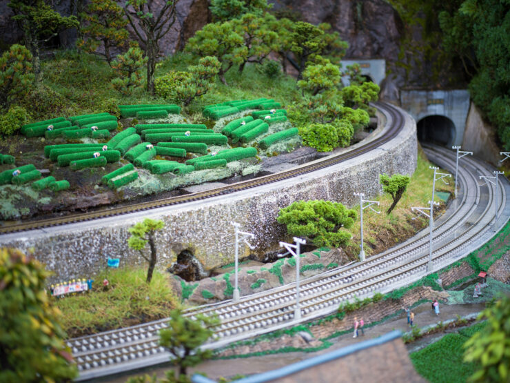 Intricate green model railway landscape