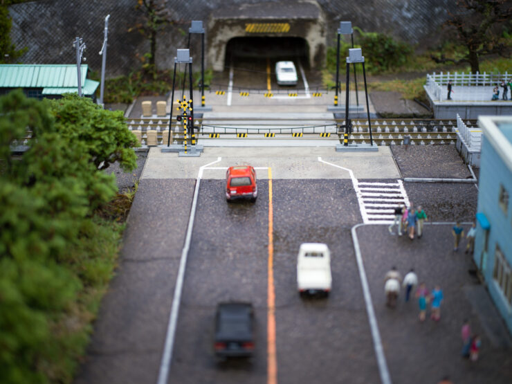Miniature tilt-shift diorama of transportation hub.