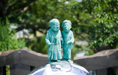 Mizuki Shigerus fantasy bronze children statues on sphere