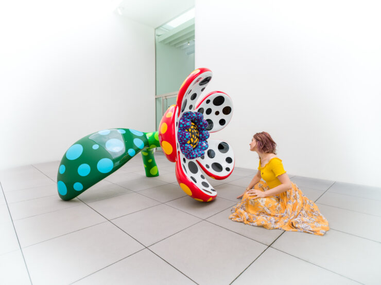 Colorful Kusama sculpture installation at exhibition