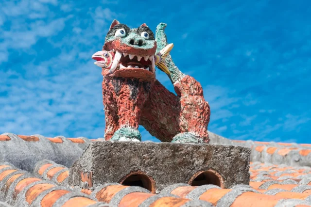 Fierce Shisa guards high, Colors dance 'neath azure skies, Ryukyu spirit shines. 高く見守るシーサー、 色が青天に踊る、 琉球の魂。 #offbeatjapan #japan #okinawa #shisa #ryukyu #culturalheritage #vibrantcolors