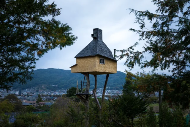 Golden walls whisper, Among emerald whispers; Where sky meets old dreams. ---黄金の壁、 エメラルドの囁き; 空が古き夢に触れる。 ---#offbeatjapan #japan #mysticalplaces #hiddenjapan #serenesetting #mountainscape #villagelife